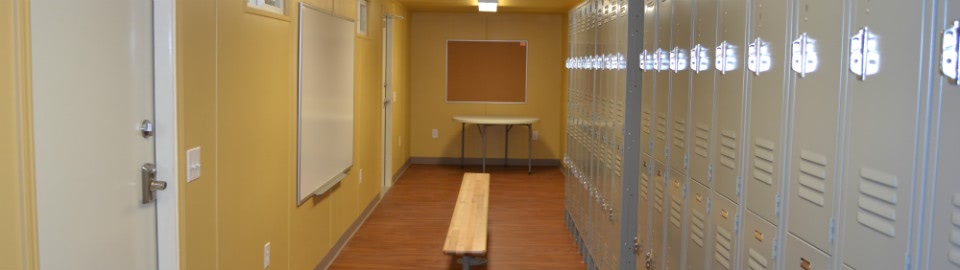 Banner for container-based modular locker room and restroom buildings. Banner for container-based modular locker room and restroom buildings.