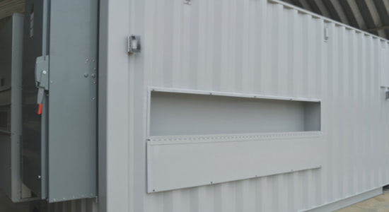Utility port in the side of a water treatment equipment enclosure Utility port in the side of a water treatment equipment enclosure