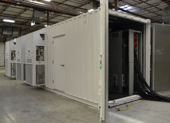 Exterior of shipping container converted to a modular equipment shelter for a UPS system