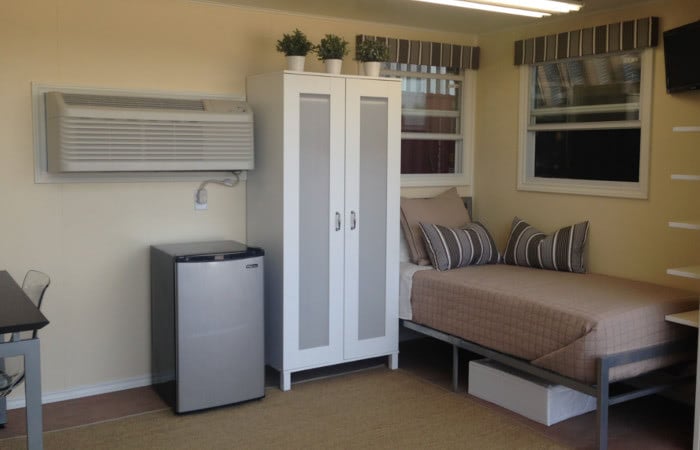 Interior of a furnished workforce housing container. Interior of a furnished workforce housing container.