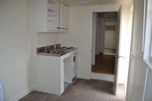Interior of a container cabin with a small kitchenette Interior of a container cabin with a small kitchenette