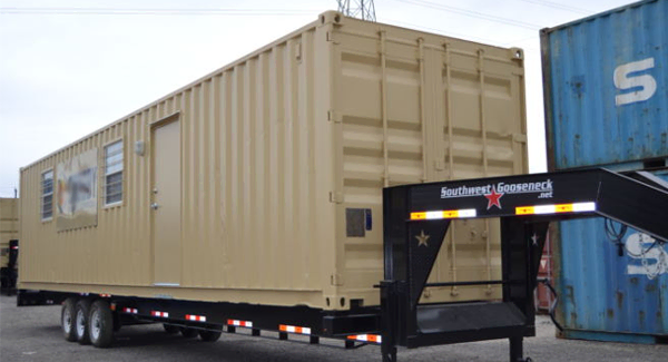 Portable shipping container living unit ready to be shipped to a man camp. Portable shipping container living unit ready to be shipped to a man camp.