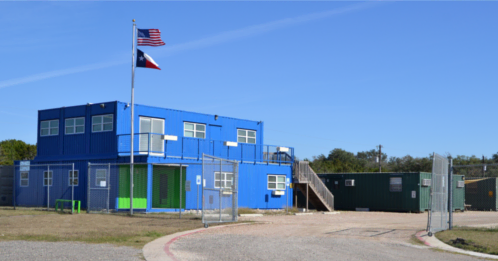 Two story custom shipping container building that's used as the Falcon Structures headquarters. Two story custom shipping container building that's used as the Falcon Structures headquarters.