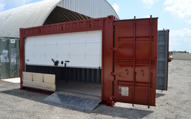 A shipping container modified for storage at a marina with a roll up door and a folding ramp. A shipping container modified for storage at a marina with a roll up door and a folding ramp.