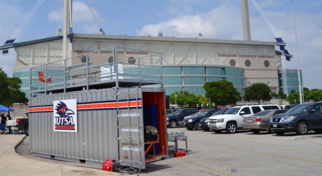 Portable container storage unit painted with college athletics colors Portable container storage unit painted with college athletics colors