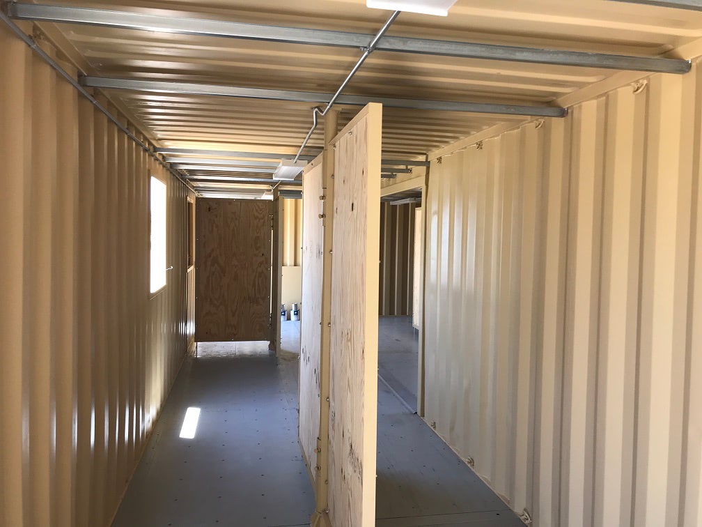Custom solution for training facility: pivoting interior walls