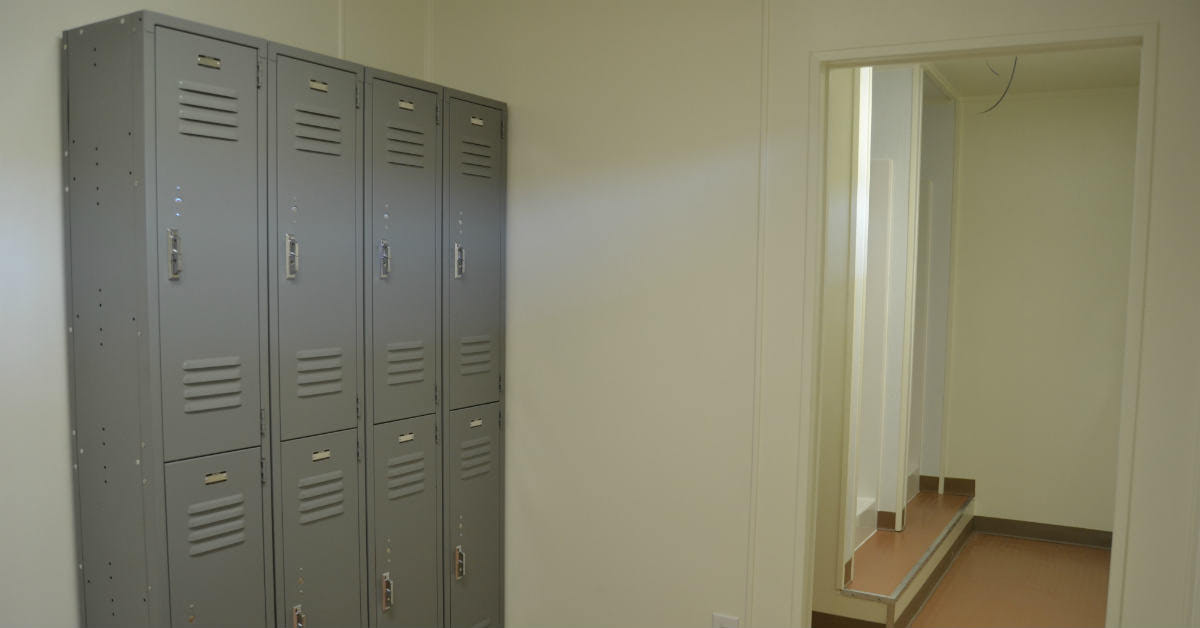 Interior of locker room with showers. Interior of locker room with showers.