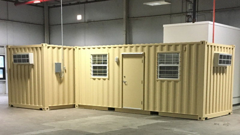 shipping container office inside a warehouse