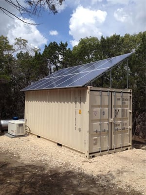 Shipping container structure with large enough solar panels and batteries to power an R.V.