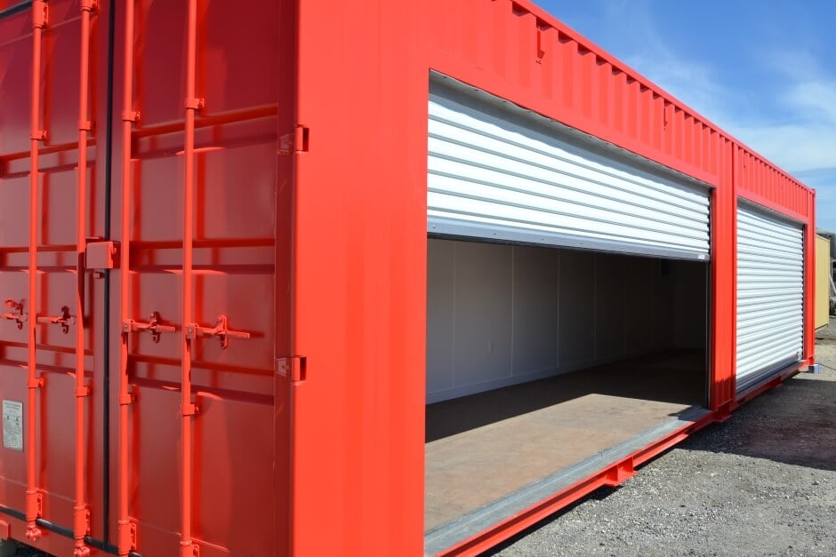 red shipping container with two roll up doors 