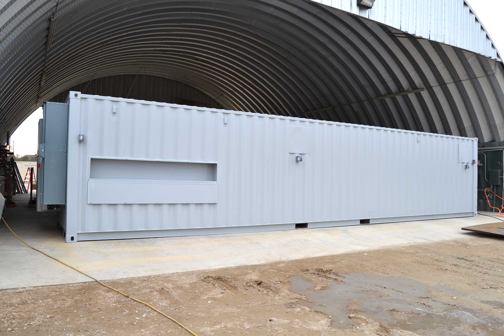 Water treatment enclosure custom container