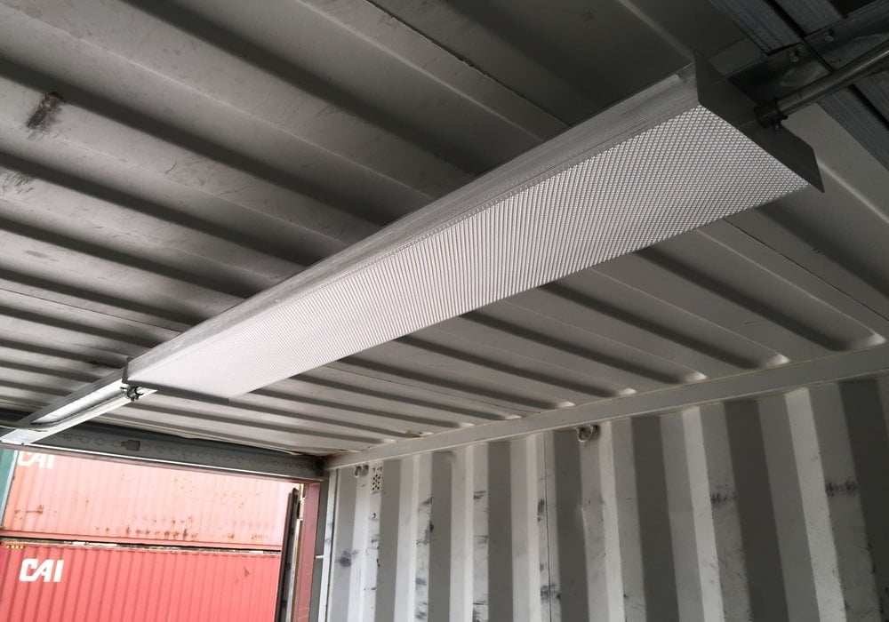 Overhead light in a non-climate controlled container