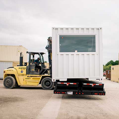 forklift moving office container