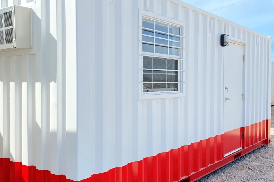 ground level office container with a red stripe