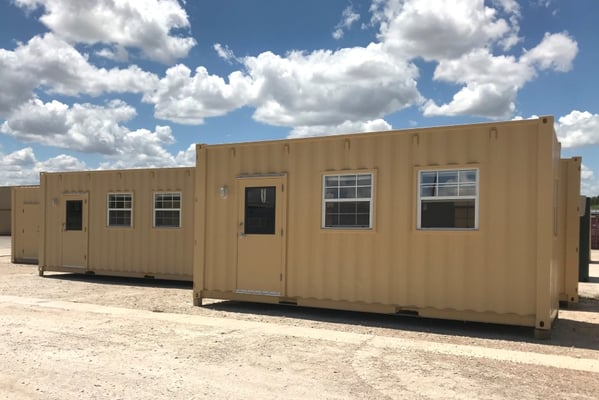 two mobile shipping container offices with multiple windows