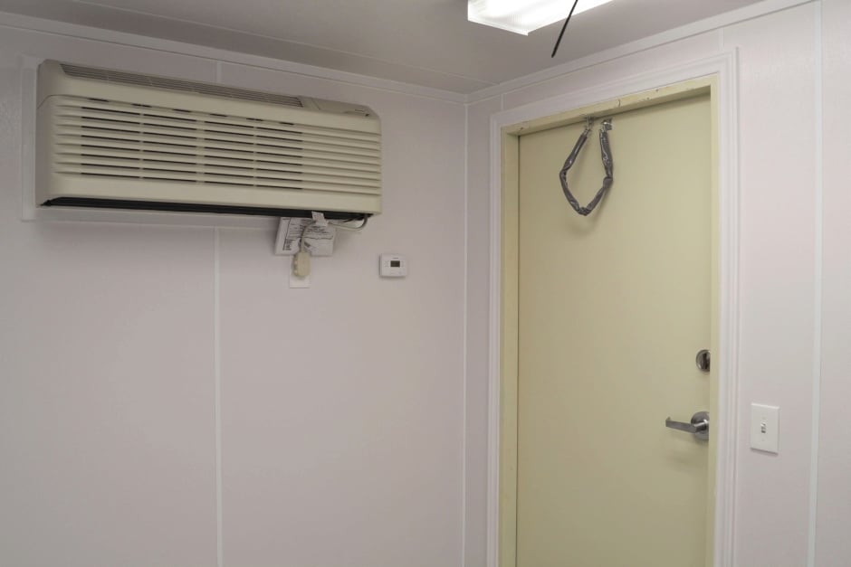 Shipping container air conditioning in office