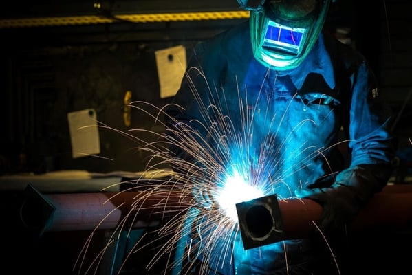 welder working with metal