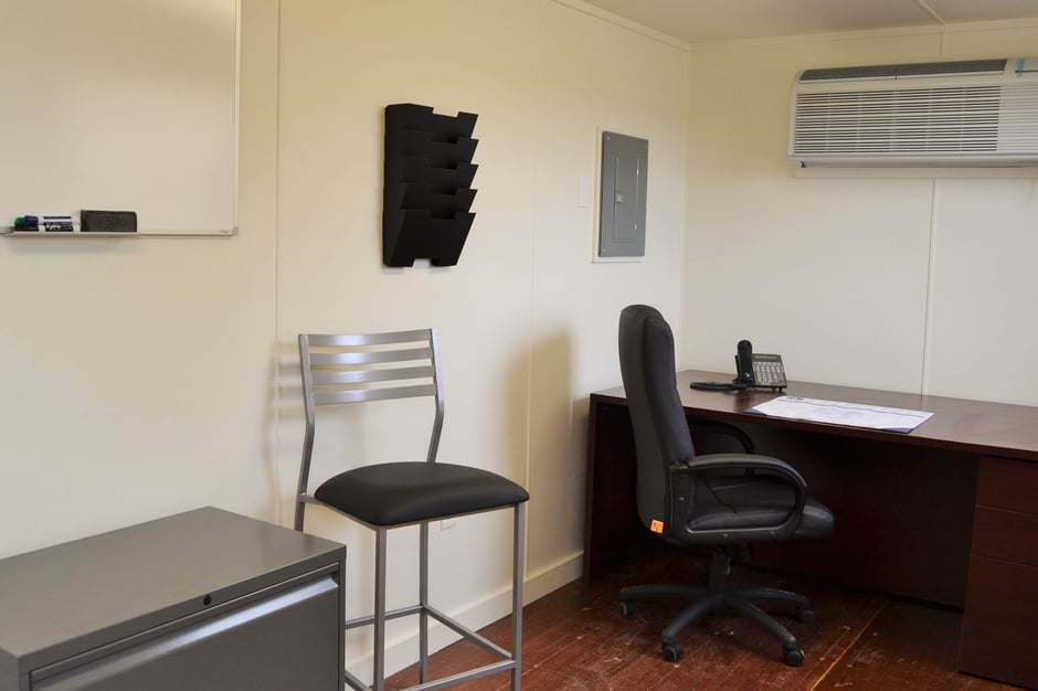 interior of modified shipping container workspace