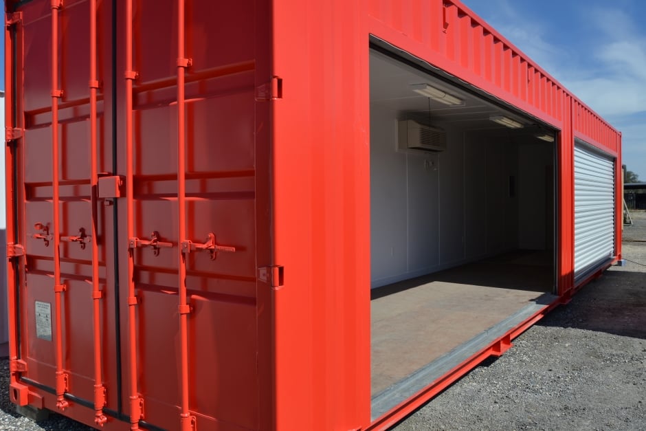 red shipping container with side roll up doors