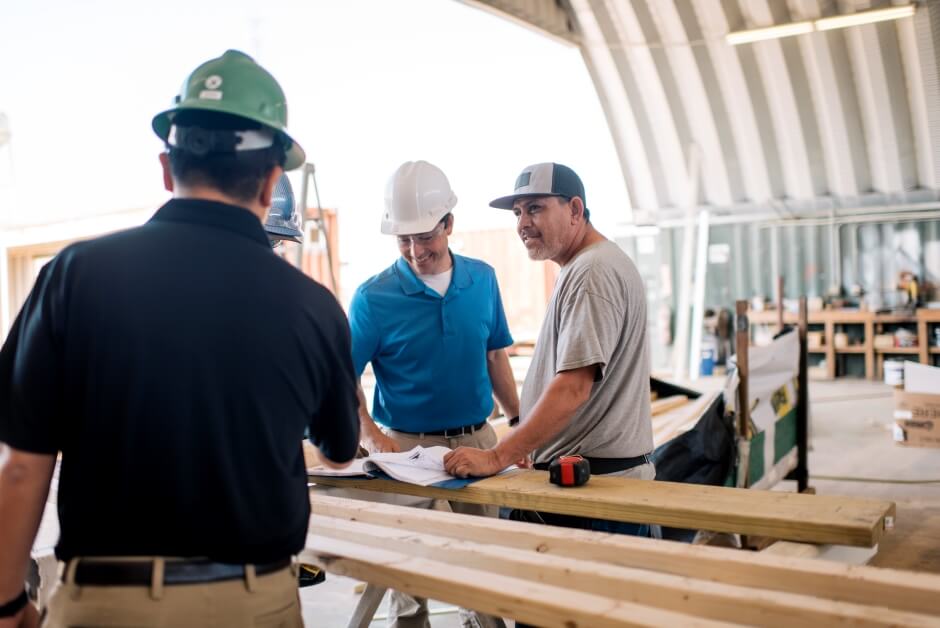 Carpentry workers making a plan