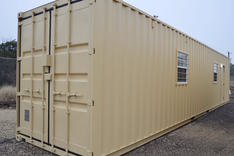 exterior of portable office storage container with two windows and one door
