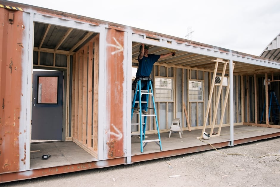 modified shipping container with wood framing