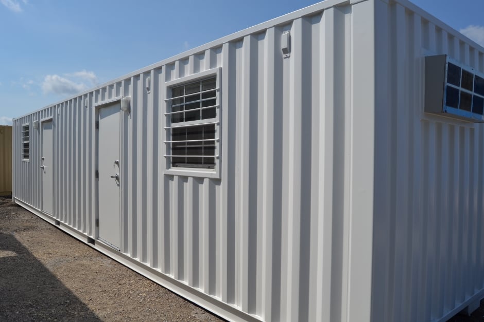 shipping container office with two windows and two doors