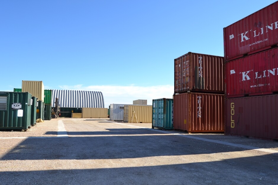 different shipping container types and sizes at a modification factory