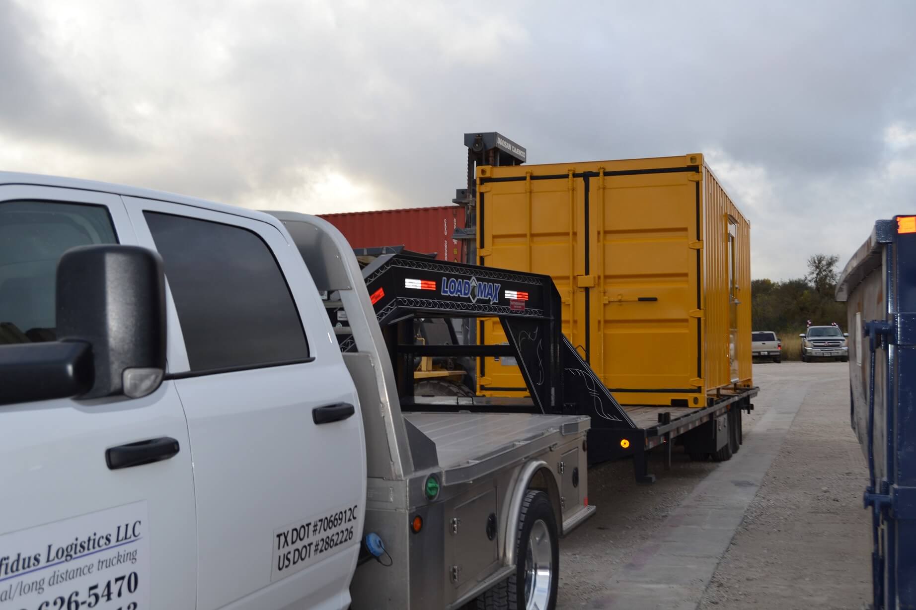 yellow shipping container on a truck