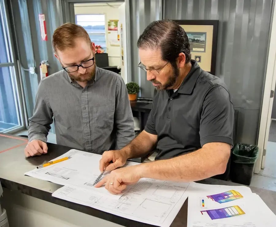 falcon employees reviewing container plans