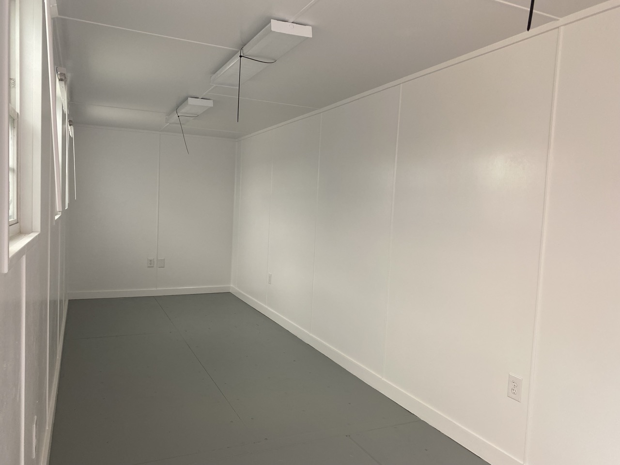 40ft work and store interior with proxy flooring and windows