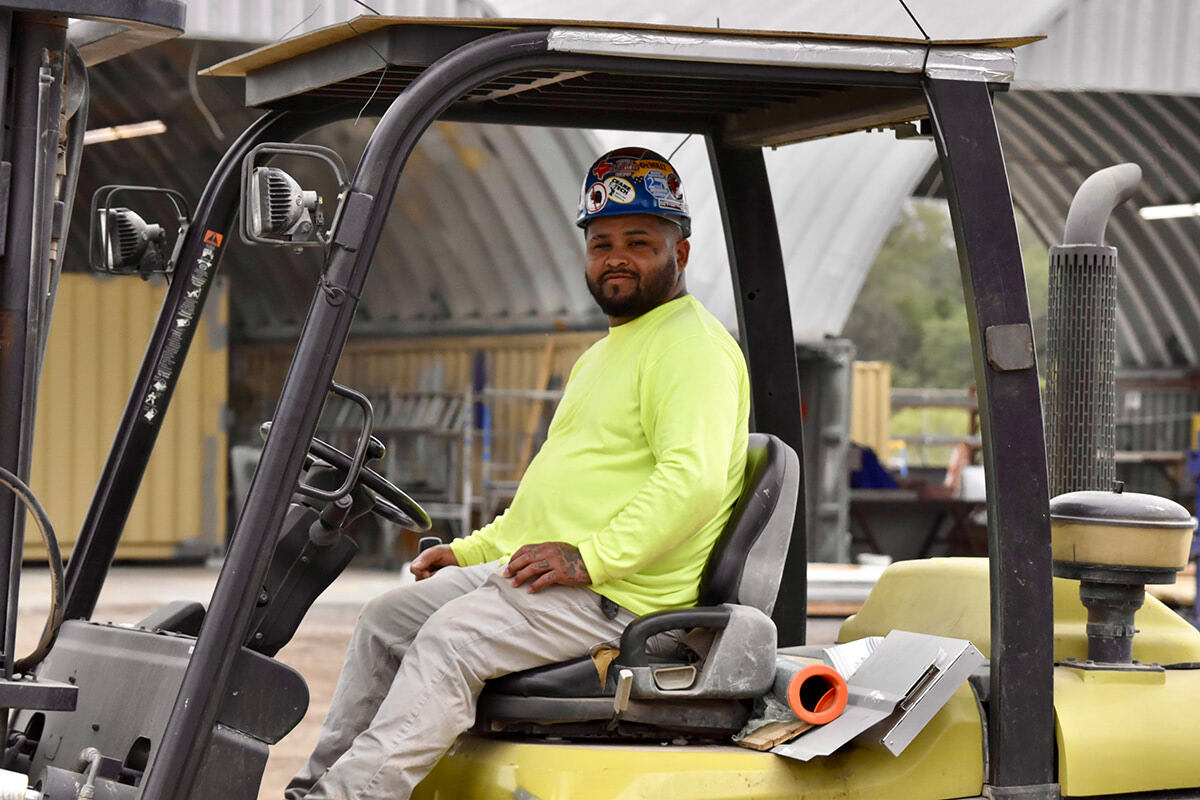 man-on-forklift