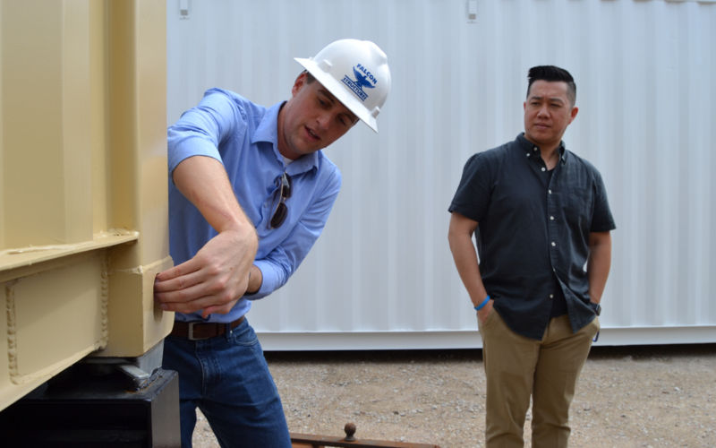 Mike Combs from the sales department explains twist locks on the job. Mike Combs from the sales department explains twist locks on the job.
