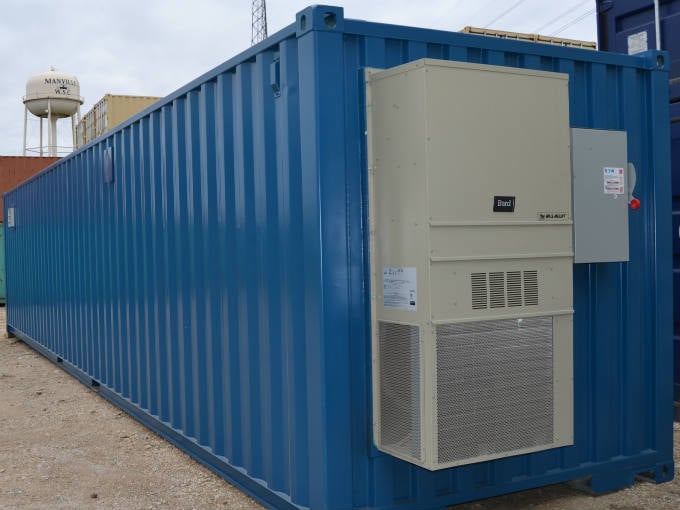 shipping container structure on a concrete foundation